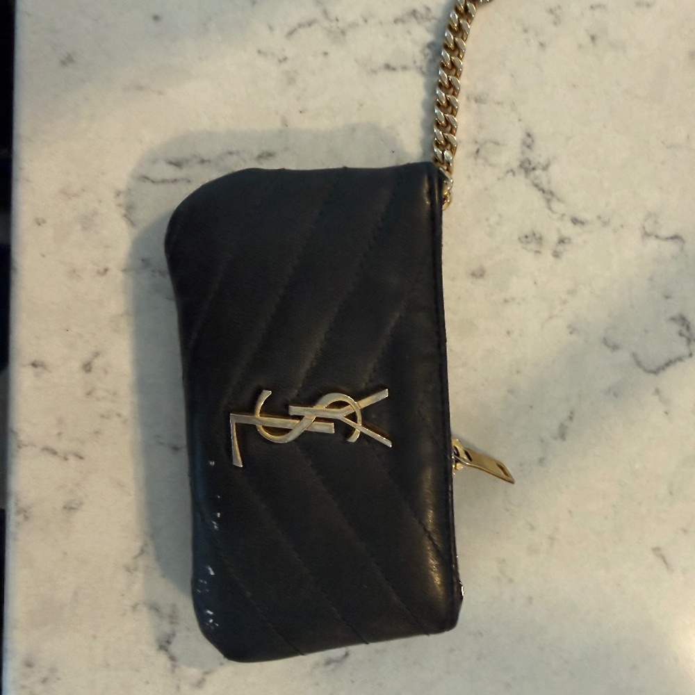 Saint Laurent women’s Monogram Matelasse Leather Zip-Around Wallet